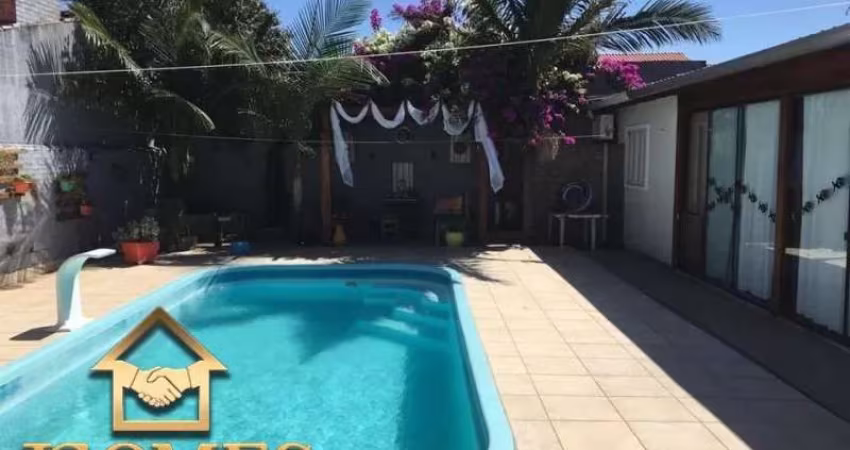 CASA COM PISCINA EM IMBÉ