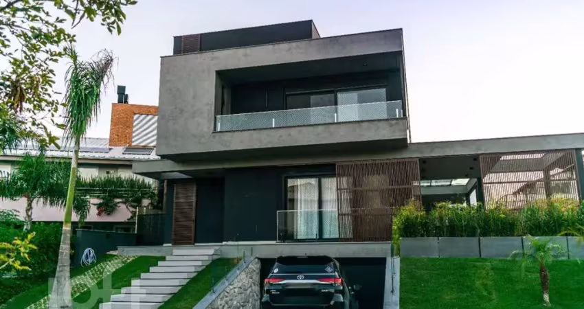Casa em condomínio fechado com 5 quartos à venda na Rodovia Doutor Antônio Luiz Moura Gonzaga, 3801, Rio Tavares, Florianópolis