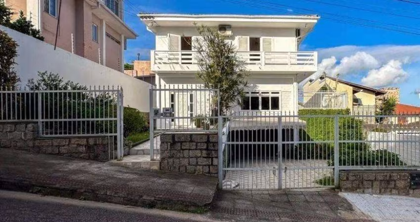 Casa de 4 dormitórios à venda em Coqueiros