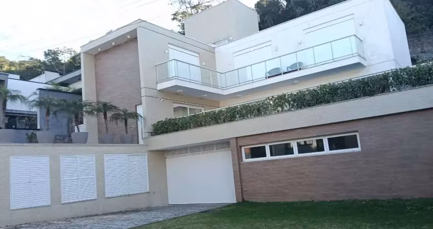 Casa em condomínio fechado com 4 quartos para alugar na Rodovia Admar Gonzaga, 3180, Itacorubi, Florianópolis