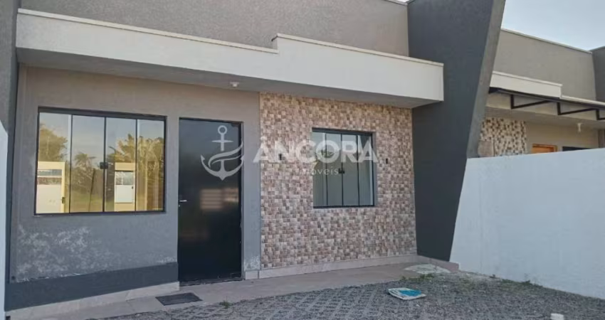 Casa bem localizada com 3 quartos, à venda no Balneário Cambiju