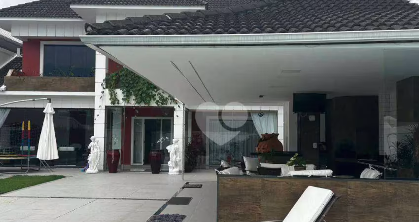 Casa com 4 suítes e lazer privativo em condomínio na barra da tijuca - porteira fechada