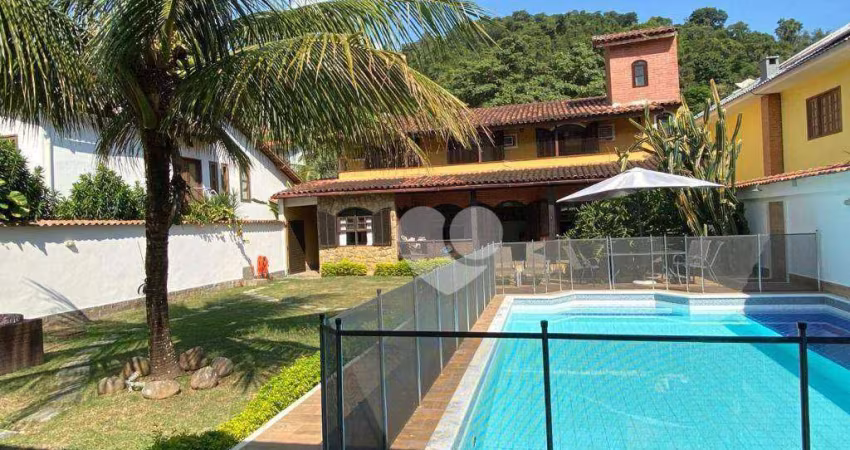 Casa com 4 quartos à venda, 409 m² por R$ 1.600.000