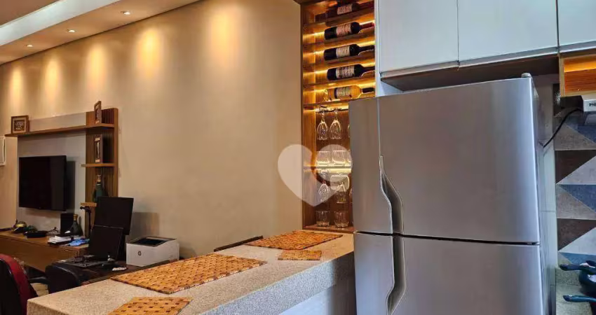 Meier vendo sala /loft com cozinha americana e banheiro com blindex.