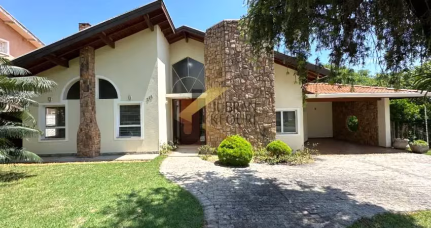 Casa térrea à venda em condomínio de alto padrão - alphaville campinas. com suítes, piscina, espaço gourmet e garagem para vários carros