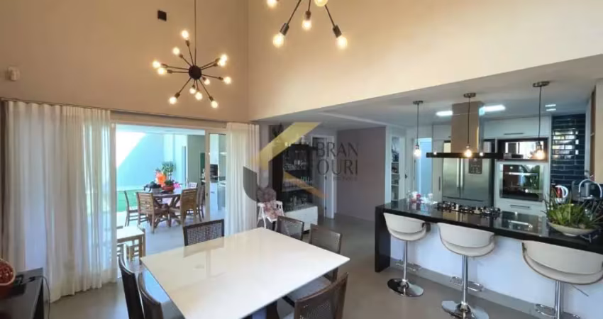 Casa em condomínio à venda em jaguariúna com  5 dormitórios (4 suítes climatizadas - máster com closet) terraço gourmet e garagem para vários carros.