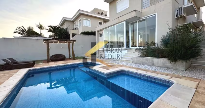 Casa à venda no alphaville dom pedro - campinas, com 3 suítes, lazer privativo com piscina e garagem para 4 carros.