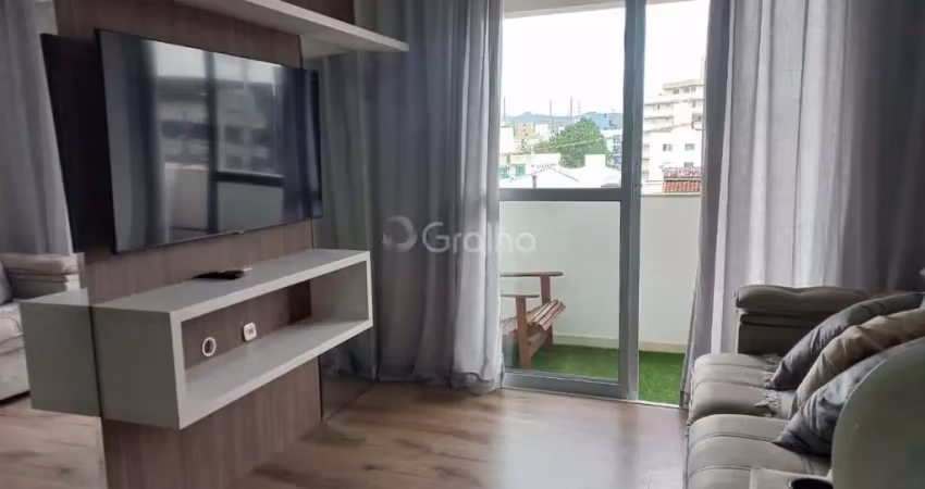 Apartamento de 65m² com 2 quartos sendo 1 suíte no bairro pagani em palhoça/sc