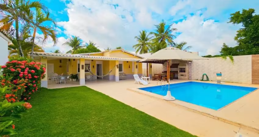 Venha viver o estilo de vida dos seus sonhos nesta deslumbrante casa térrea de 4 quartos, sendo 3 suítes, localizada na renomada praia de guarajuba.