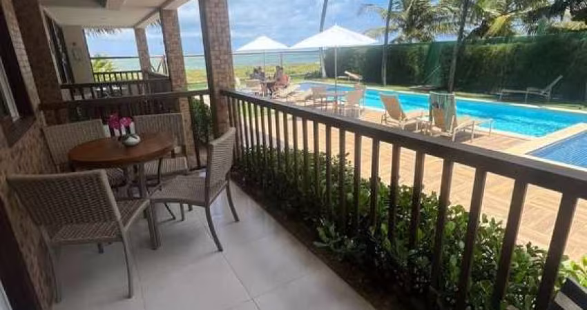 OPORTUNIDADE IMPERDÍVEL! Village mobiliado com 73 m², 2 quartos sendo 1 suíte, varanda e 2 vagas em condomínio à beira-mar em Itacimirim.