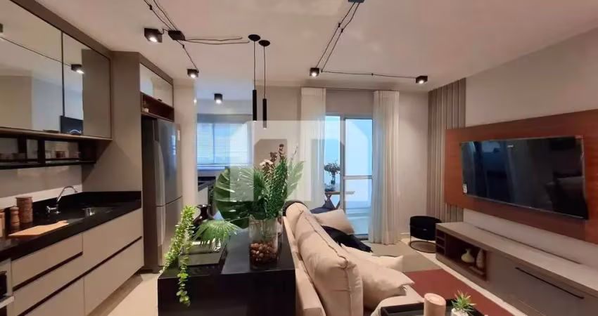 Apartameno a venda de 55 m², 2 dormitórios, ampla sala 2 ambientes com churrasqueira  e 1 vaga.
