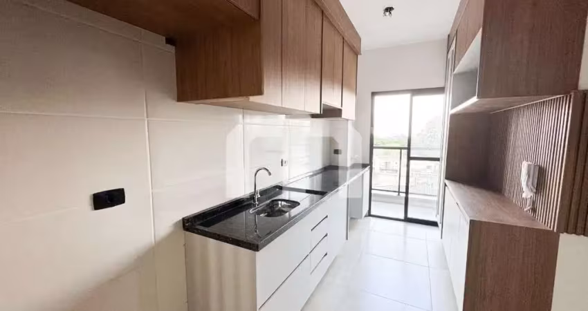 Apartamento 2 dormitórios com vaga de garagem e varanda com móveis planejados