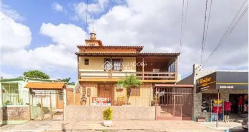 Casa com 4 quartos à venda na Juscelino Kubitschek de Oliveira, 579, Parque Granja Esperança, Cachoeirinha