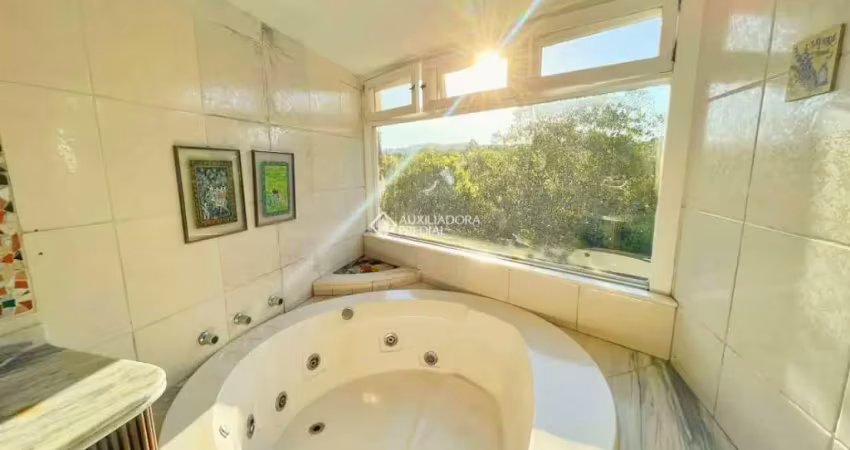 Casa em condomínio fechado com 3 quartos à venda na Rua Tocantins, 937, Lomba do Pinheiro, Porto Alegre