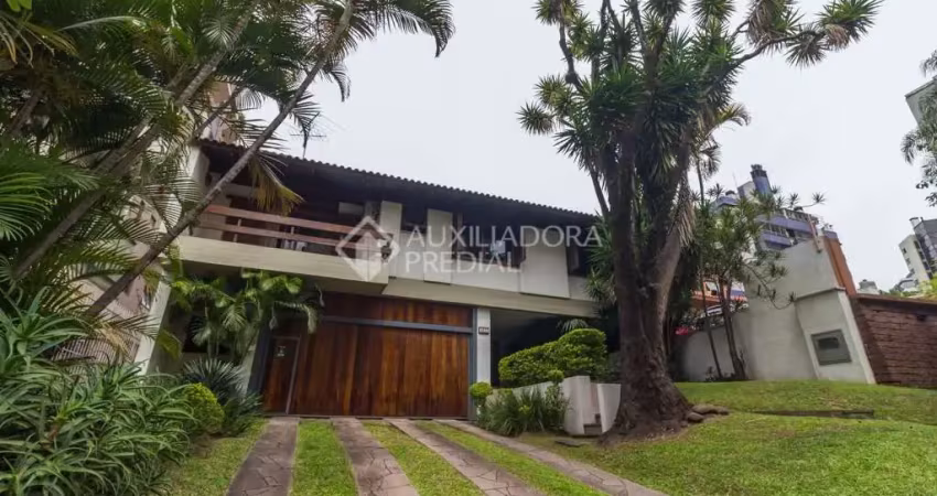 Casa em condomínio fechado com 4 quartos à venda na Rua Carlos Trein Filho, 1255, Auxiliadora, Porto Alegre