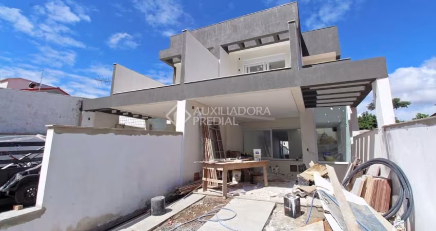 Casa com 3 quartos à venda na Rua Elízio Abate Crivella, 245, Jardim Itu Sabará, Porto Alegre
