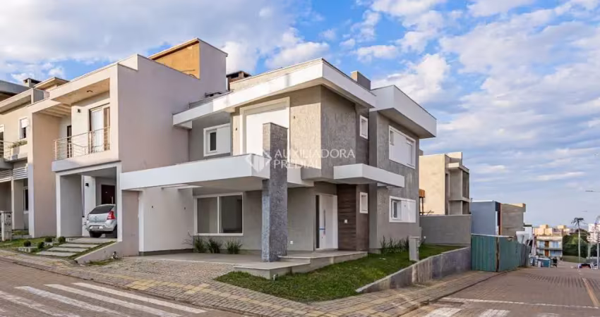 Casa em condomínio fechado com 3 quartos à venda na Rua Tancredo Neves, 990, Jansen, Gravataí