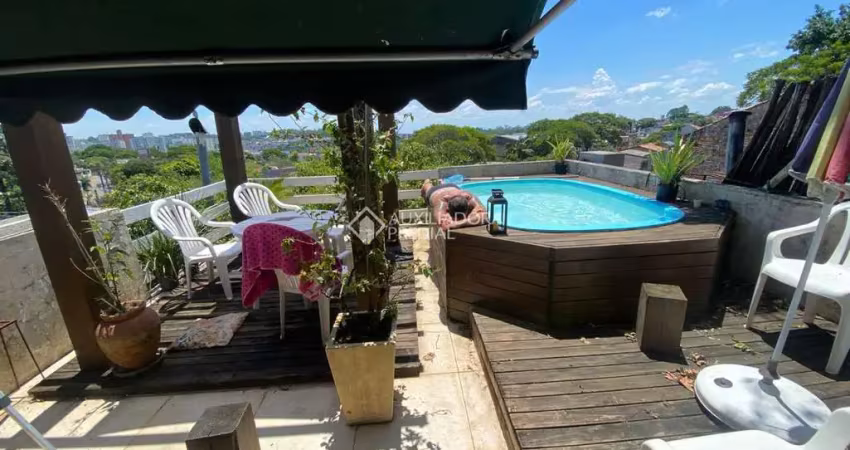 Casa com 3 quartos à venda na Rua Natércia Cunha Veloso, 267, Morro Santana, Porto Alegre