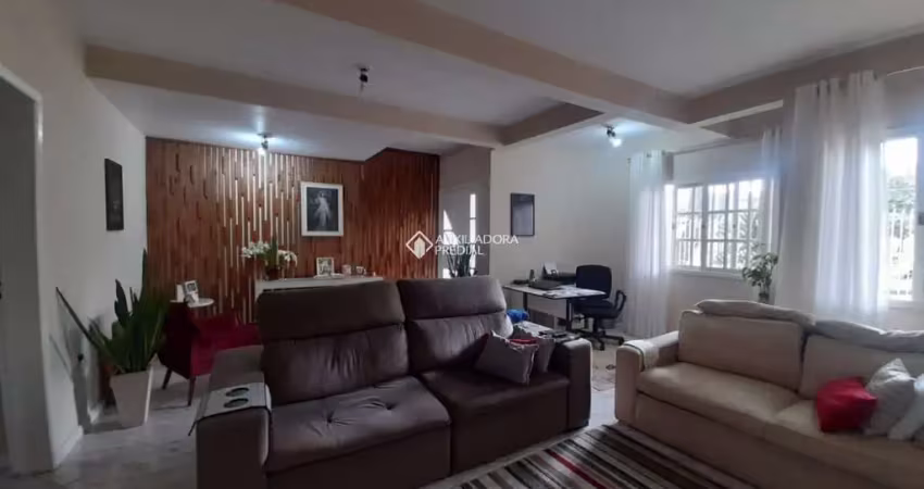 Casa em condomínio fechado com 3 quartos à venda na Rua Engenheiro Frederico Dahne, 525, Sarandi, Porto Alegre