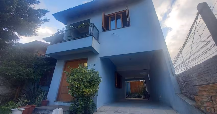 Casa com 3 quartos à venda na Rua Humberto de Campos, 775, Partenon, Porto Alegre