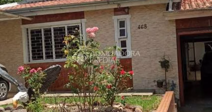 Casa com 5 quartos à venda na Rua Tupi, 468, Vila Monte Carlo, Cachoeirinha