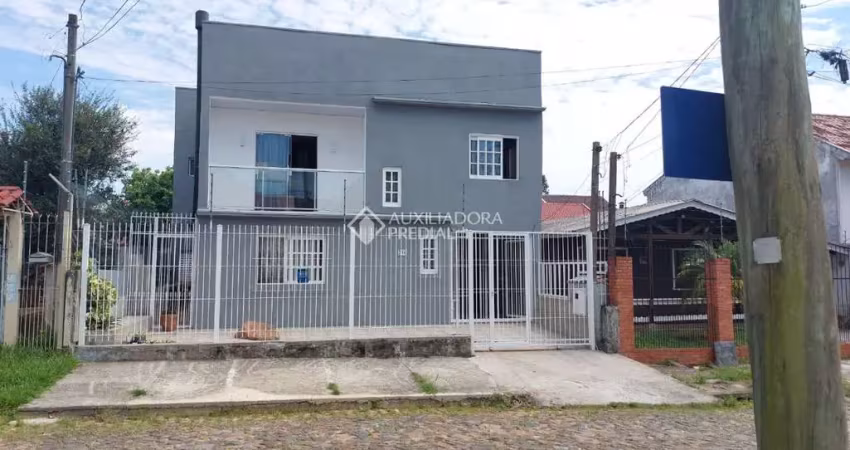 Casa com 4 quartos à venda na Rua Professor Álvaro Barcellos Ferreira, 210, Parque Santa Fé, Porto Alegre