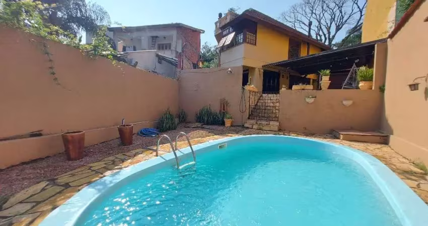 Casa com 3 dormitórios à venda, 150 m² por R$ 695.000,00 - Morro do Espelho - São Leopoldo/RS
