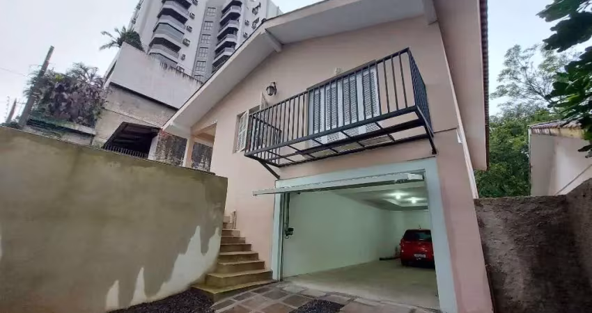 Casa com 3 dormitórios, 197 m² - venda por R$ 650.000,00 ou aluguel por R$ 3.650,00/mês - Vila Nova - Novo Hamburgo/RS