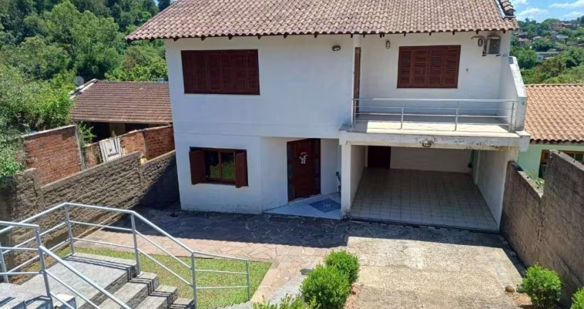 Casa com 3 dormitórios, 250 m² - venda por R$ 450.000,00 ou aluguel por R$ 4.000,00/mês - Rincão - Novo Hamburgo/RS