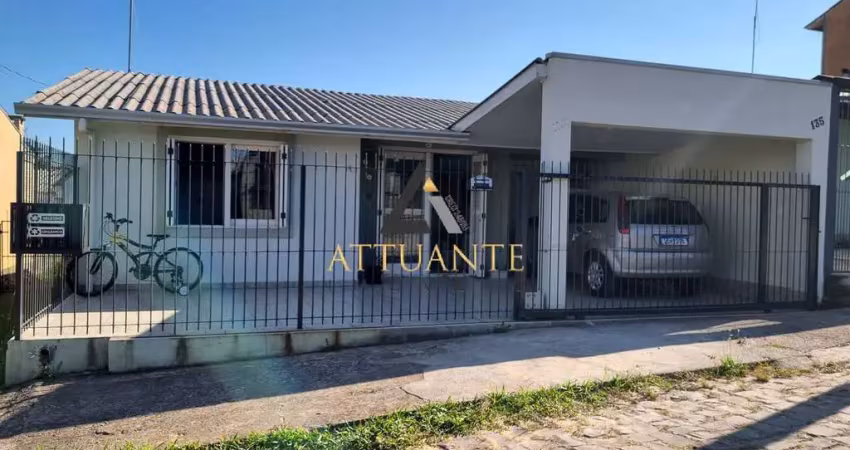 Encantadora casa com pátio localizada no Bairro Desvio Rizzo