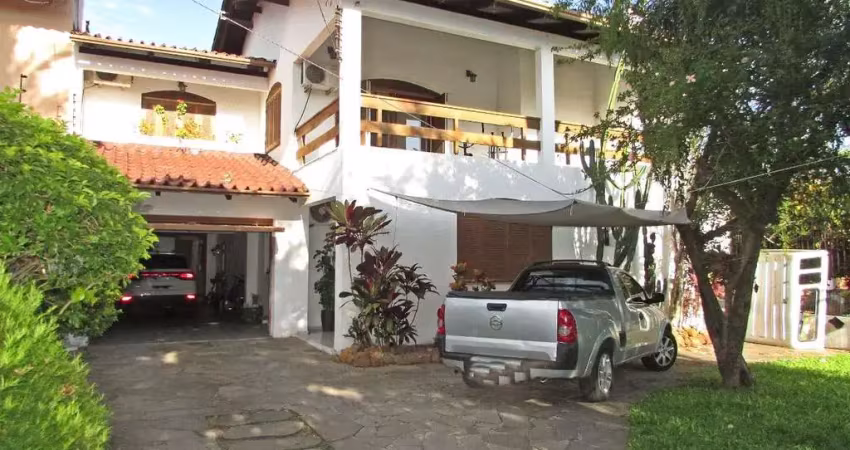 Casa com 5 quartos à venda na Rua Zeferino Dias, 510, Cavalhada, Porto Alegre