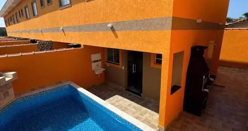 Lindo sobrado na praia lado praia com piscina e churrasqueira