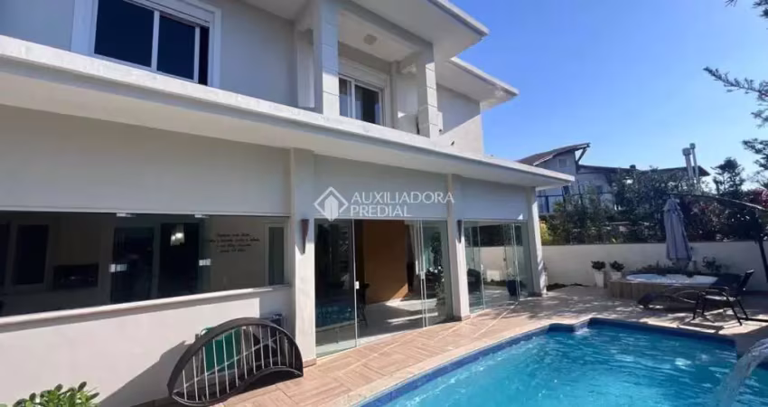 Casa em condomínio fechado com 4 quartos à venda na Rodovia Doutor Antônio Luiz Moura Gonzaga, 3825, Rio Tavares, Florianópolis