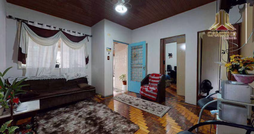Vendo casa de dois dormitórios e oito vagas de garagem, bairro Sarandi em Porto Alegre
