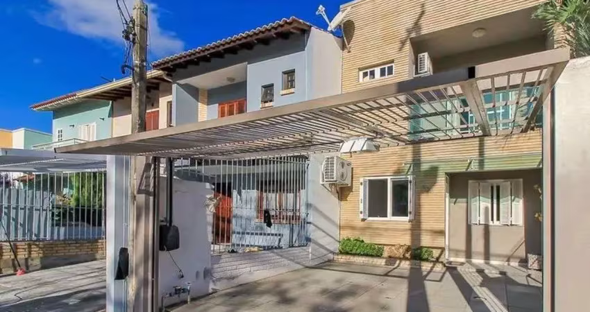 Casa em condomínio fechado com 3 quartos à venda na Rua Doutor Hermes Pacheco, 630, Hípica, Porto Alegre