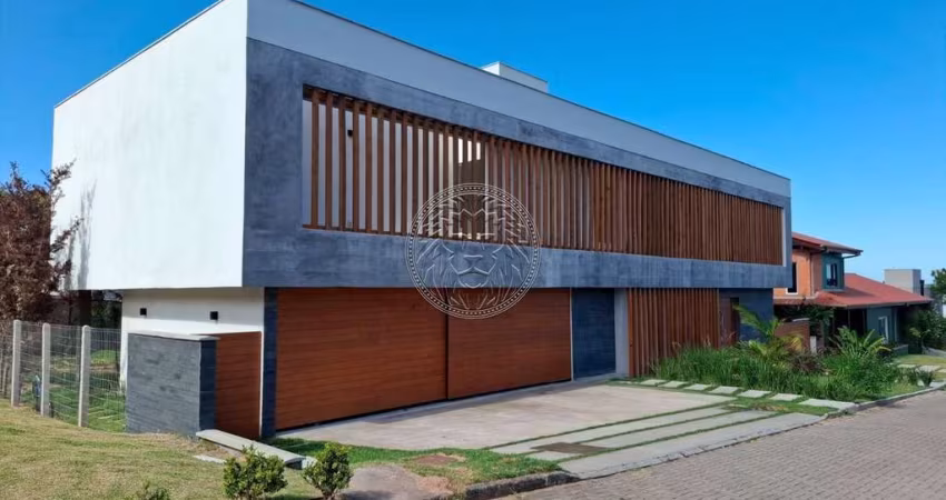 Casa em condomínio fechado com 6 quartos à venda no Rio Tavares, Florianópolis 
