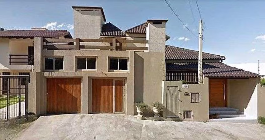 Casa com 3 dormitórios à venda, 270 m² por R$ 646.000,00 - Jardim América - São Leopoldo/RS