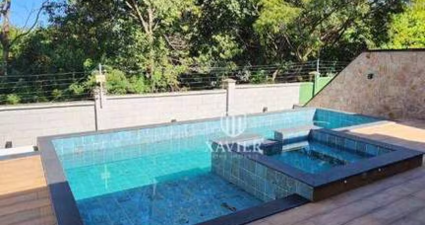 Casa Térrea com Vista para a Mata – 4 Suítes e Piscina!