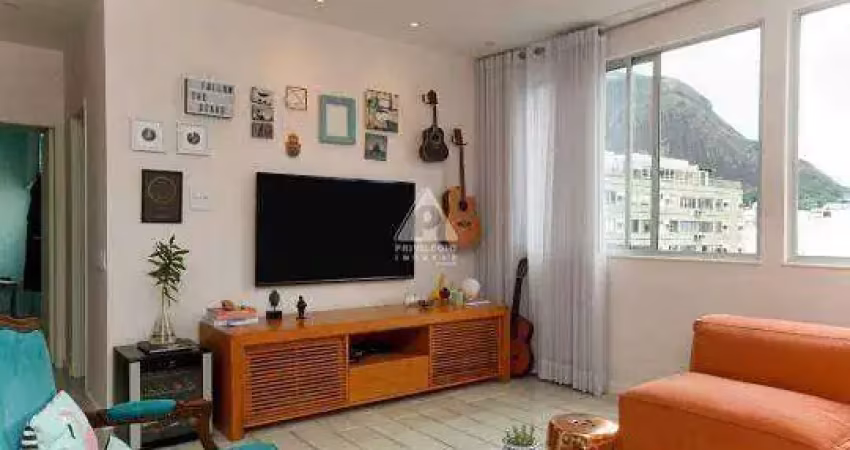 Apartamento de 3 quartos no jardim botânico, andar alto, vista para lagoa e pedra da gávea com duas vagas