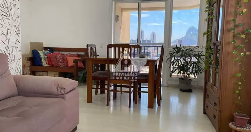 Apartamento de 2 quartos, com varanda andar alto com vaga em rua nobre em botafogo
