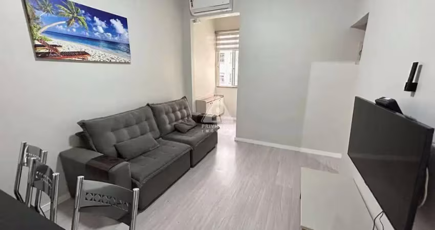 Privilégio imóveis vende: excelente apartamento 2 quartos de frente em rua tranquila e arborizada
