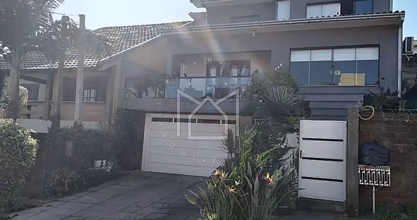 Casa com 4 quartos à venda na Rua João Carlos Linck, 140, Loteamento Jardim Timbaúva, Gravataí