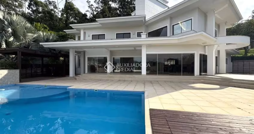 Casa em condomínio fechado com 5 quartos à venda na Rua Capitão Romualdo de Barros, 705, Carvoeira, Florianópolis