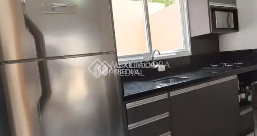 Casa em condomínio fechado com 2 quartos para alugar na Rua Balduíno Michel, 34, Rondônia, Novo Hamburgo