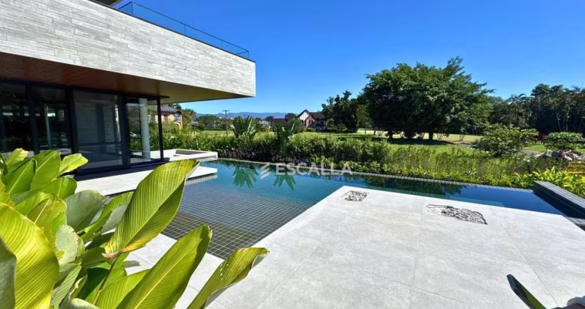 Casa de luxo à venda no Joinville Country Club – 5 suítes, piscina com raia e automação completa!