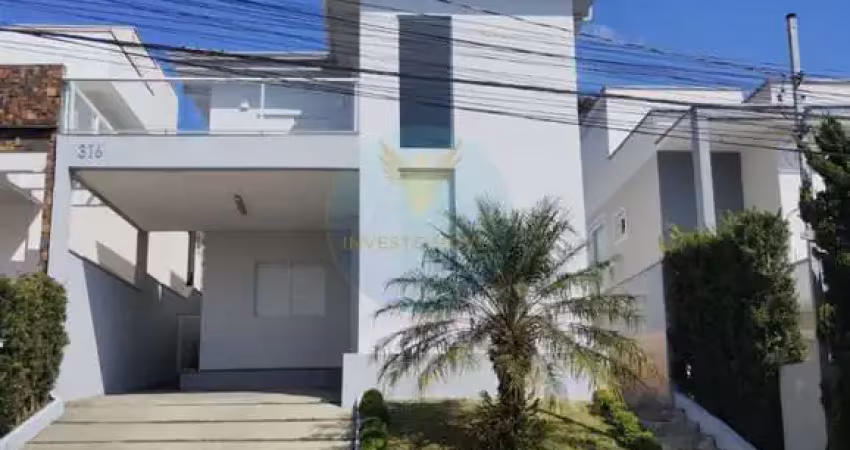 Casa com 4 suítes e área gourmet em condomínio arborizado