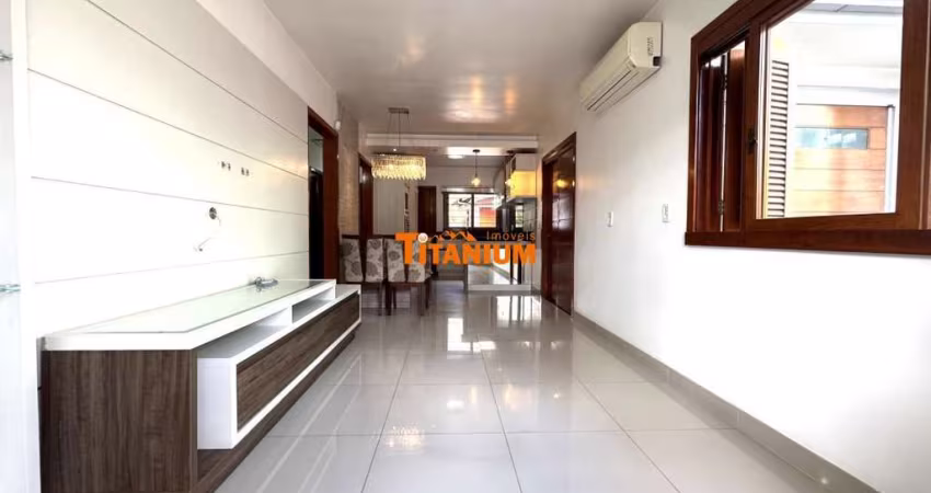 Casa plana com 3 dormitórios, sendo uma suíte, closet e banheira de hidro, churrasqueira, placa solar, piscina, local plano à venda em Novo Hamburgo.