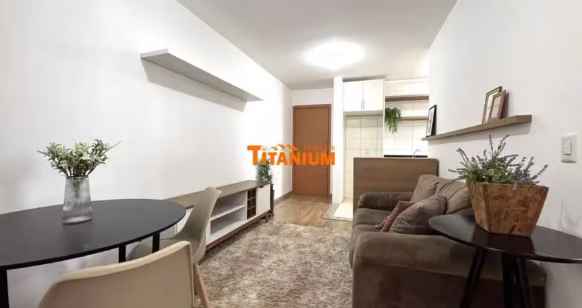 Apartamento com 2 dormitórios, praticamente todo mobiliado, sacada com churrasqueira, garagem, prédio com elevador, ótima localização à venda no bairro vila rosa, novo hamburgo