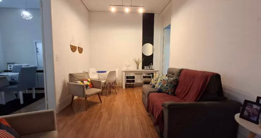 Vendo ampla casa geminada de 2 domitorios com terceiro reversível na vila mathias em santos
