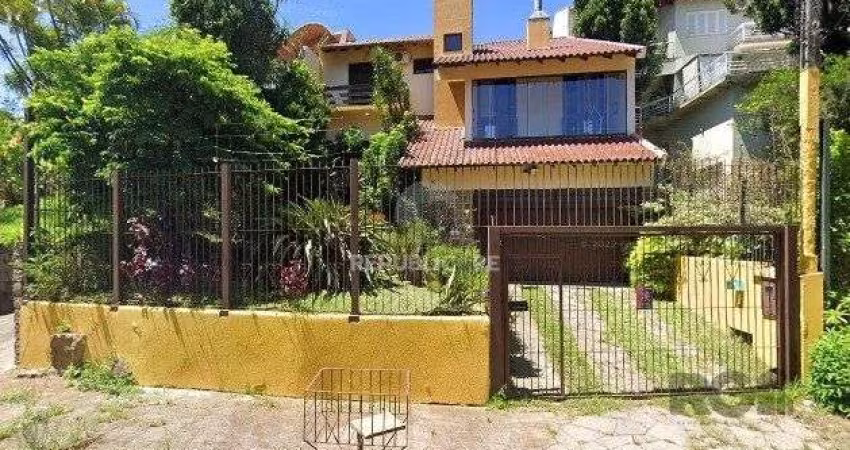 Casa 4 dormitórios à venda Teresópolis Porto Alegre/RS